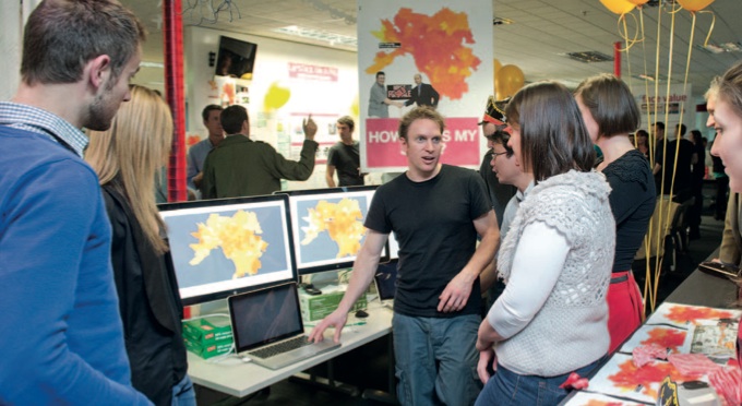 A colleague demonstrating his team's hack day project